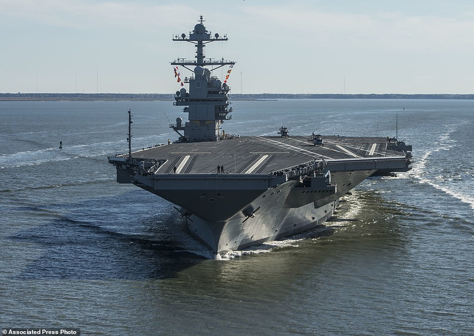 In this photo provided by the U.S. Navy, the USS Gerald R. Ford embarked on the first of its sea trials to test various state-of-the-art systems on its own power for the first time Saturday, April 8, 2017, from Newport News, Va. The first of the Navy's new class of aircraft carriers will spend several days conducting builder's sea trials, a comprehensive test of many of the ship's key systems and technologies. (Mass Communication Specialist 2nd Class Ridge Leoni/U.S. Navy via AP)